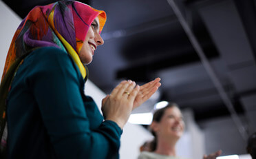 A woman clapping